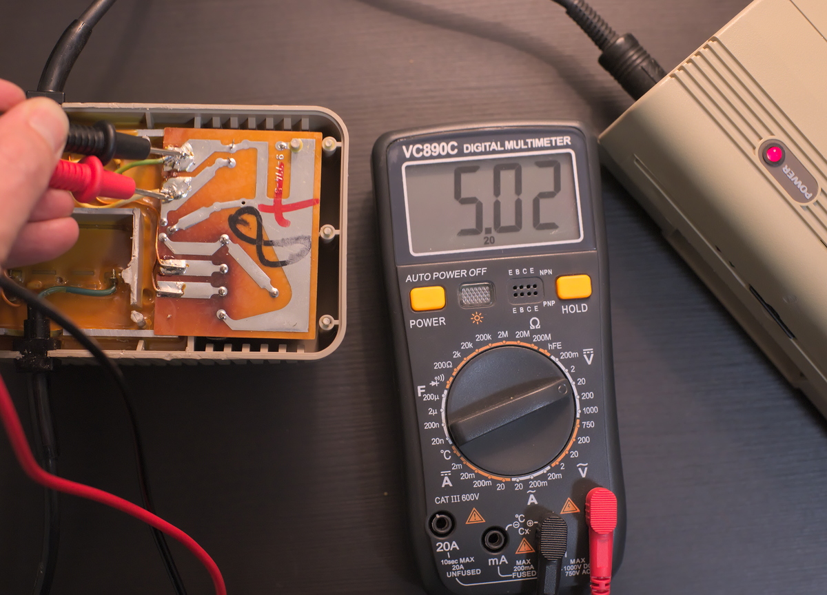 64 psu brick voltage measured at 5.02V while powering C64